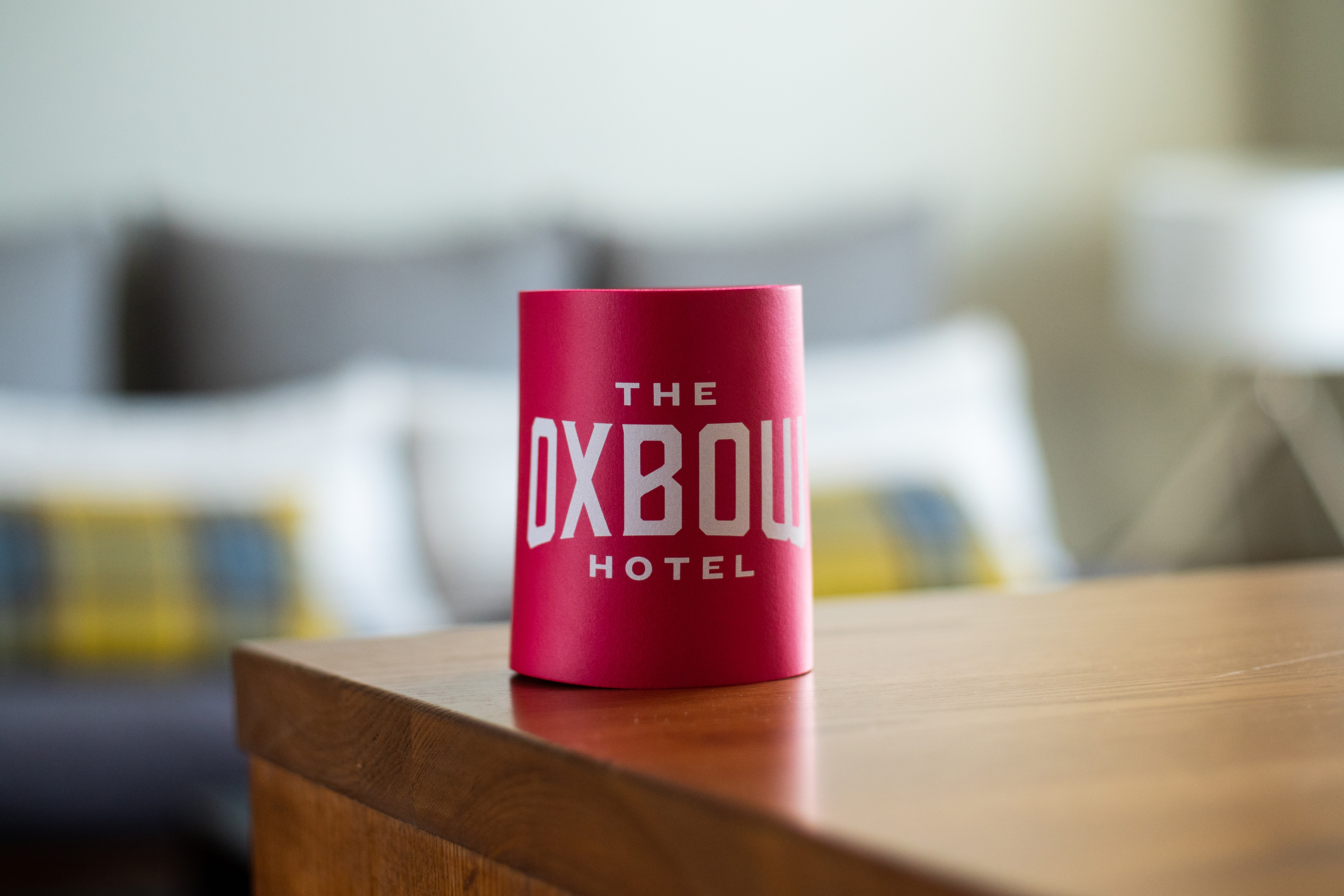 https://www.theoxbowhotel.com/wp-content/uploads/2018/08/can_koozie_red_1.jpg